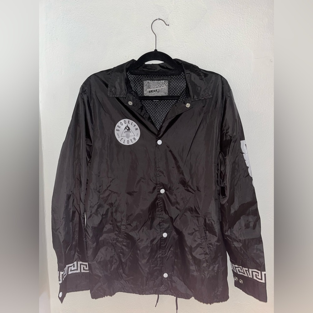 Brooklyn black/white bomber, RIP underneath left sleeve.